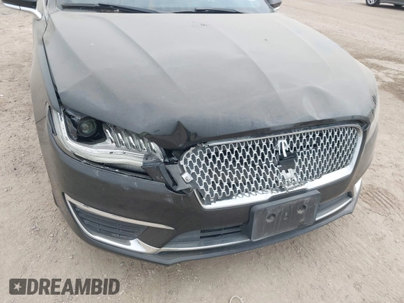 2017 Lincoln MKZ Reserve z VIN 3LN6L5EC4HR619712, wystawiony jako IAAI lot #41899418 z przebiegiem 77 481 mil mil oraz . Historia ofert i sprzedaży dostępna na DreamBid. Obrazek 6.