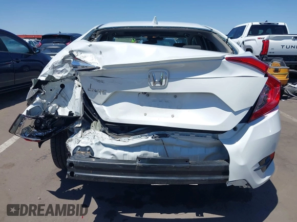 2019 Honda Civic EX z VIN 19XFC1F38KE003716, wystawiony jako IAAI lot #42293611 z przebiegiem 109 882 mil mil oraz . Historia ofert i sprzedaży dostępna na DreamBid. Obrazek 16.