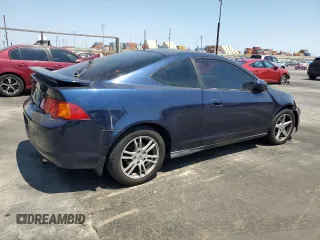 2002 Acura RSX Auto with VIN JH4DC548X2C030807, listed as a Copart auction lot 65178665 with 138,260 mi miles and Salvage title. Bid and sale history available at DreamBid. Image 3.