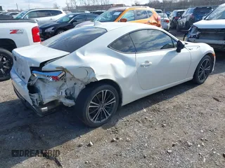2015 Scion FR-S with VIN JF1ZNAA13F8707454, listed as a IAAI auction lot 41239233 with 130,126 mi miles. Bid and sale history available at carsss.com. Image 4.