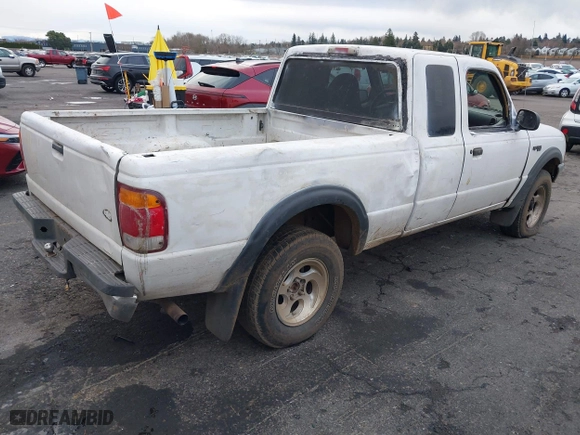 1999 Ford Ranger XLT with VIN 1FTZR15XXXTA09502, listed as a IAAI auction lot 41794904 with 203,276 mi miles. Bid and sale history available at carsss.com. Image 4.