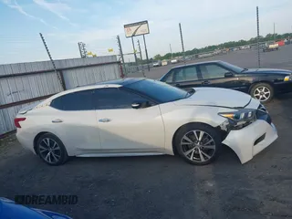 2017 Nissan Maxima S with VIN 1N4AA6AP2HC367322, listed as a IAAI auction lot 42012073 with 116,497 mi miles and . Bid and sale history available at DreamBid. Image 13.