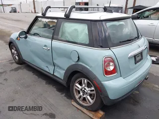 2013 MINI Hardtop with VIN WMWSU3C50DT546031, listed as a IAAI auction lot 42542290 with 119,711 mi miles and . Bid and sale history available at DreamBid. Image 3.