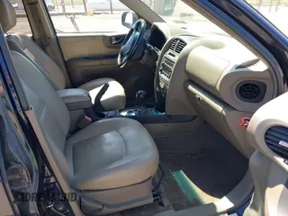 2005 Hyundai Santa Fe GLS with VIN KM8SC73E95U956010, listed as a IAAI auction lot 42134272 with 190,895 mi miles. Bid and sale history available at carsss.com. Image 5.