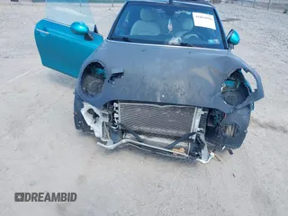 2016 MINI Convertible z VIN WMWWG5C53G3C18842, wystawiony jako IAAI lot #41864596 z przebiegiem 91 253 mil mil oraz . Historia ofert i sprzedaży dostępna na DreamBid. Obrazek 6.