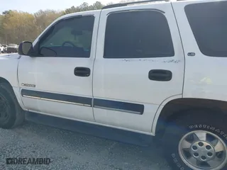 2002 Chevrolet Tahoe LS with VIN 1GNEC13V52J284059, listed as a IAAI auction lot 41899231 with 390,173 mi miles. Bid and sale history available at carsss.com. Image 14.