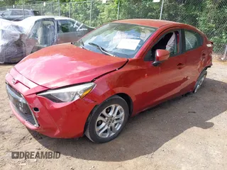 2016 Scion iA z VIN 3MYDLBZV8GY125803, wystawiony jako IAAI lot #42217519 z przebiegiem 169 388 mil mil oraz . Historia ofert i sprzedaży dostępna na DreamBid. Obrazek 2.
