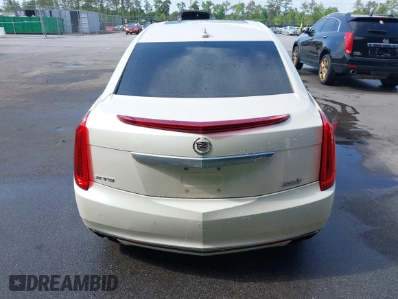 2013 Cadillac XTS Premium z VIN 2G61S5S35D9103948, wystawiony jako IAAI lot #42090444 z przebiegiem 154 728 mil mil oraz . Historia ofert i sprzedaży dostępna na DreamBid. Obrazek 16.