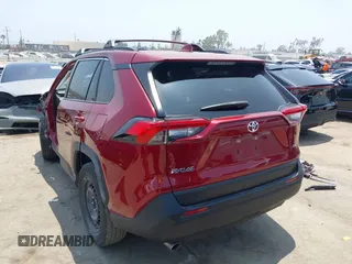 2019 Toyota RAV4 LE with VIN JTMK1RFV4KD025587, listed as a IAAI auction lot 42459046 with 73,852 mi miles and . Bid and sale history available at DreamBid. Image 3.
