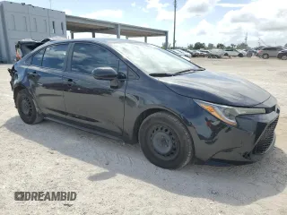 2021 Toyota Corolla L with VIN 5YFDPMAE8MP173002, listed as a Copart auction lot 52518125 with 132,609 mi miles and Salvage Title. Bid and sale history available at DreamBid. Image 4.