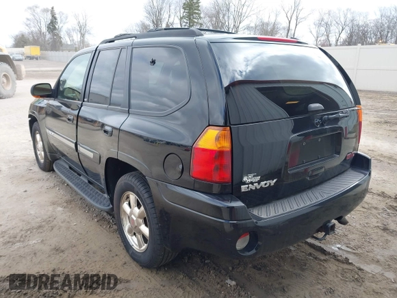 2002 GMC Envoy SLT with VIN 1GKDT13S622506181, listed as a IAAI auction lot 41986061 with 212,583 mi miles. Bid and sale history available at carsss.com. Image 3.