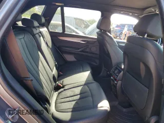 2015 BMW X5 xDrive35i z VIN 5UXKR0C57F0K61171, wystawiony jako Copart lot #57555405 z przebiegiem 119 664 mil mil oraz Szkoda całkowita • Salvage title. Historia ofert i sprzedaży dostępna na DreamBid. Obrazek 11.