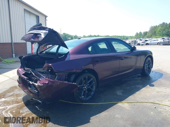 2022 Dodge Charger SXT with VIN 2C3CDXBG1NH231355, listed as a IAAI auction lot 41632420 with 28,333 mi miles and . Bid and sale history available at DreamBid. Image 4.