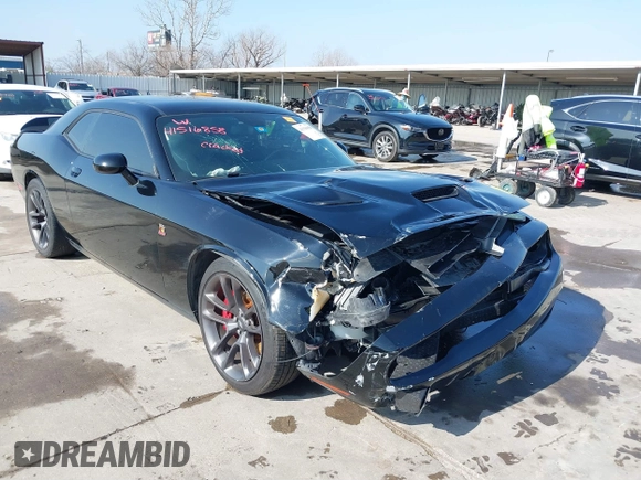 2021 Dodge Challenger R/T Scat Pack z VIN 2C3CDZFJXMH509833, wystawiony jako IAAI lot #41516858 z przebiegiem 66 880 mil mil oraz . Historia ofert i sprzedaży dostępna na DreamBid. Obrazek 1.