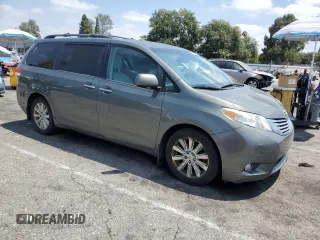 2012 Toyota Sienna XLE with VIN 5TDDK3DC1CS043460, listed as a Copart auction lot 64900495 with 190,187 mi miles and Clean title. Bid and sale history available at DreamBid. Image 4.