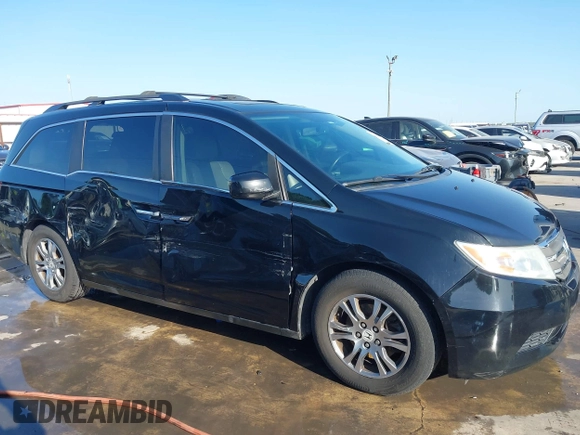 2013 Honda Odyssey EX-L with VIN 5FNRL5H6XDB090768, listed as a IAAI auction lot 42008759 with 116,052 mi miles and . Bid and sale history available at carsss.com. Image 6.