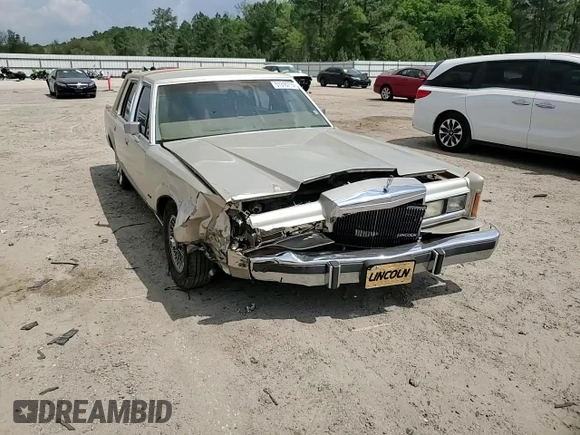 1989 Lincoln Town Car z VIN 1LNBM81F8KY816906, wystawiony jako Copart lot #51316715 z przebiegiem 361 830 mil mil oraz Szkoda całkowita • Salvage title. Historia ofert i sprzedaży dostępna na DreamBid. Obrazek 11.
