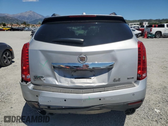 2015 Cadillac SRX Performance Collection with VIN 3GYFNFE31FS595552, listed as a Copart auction lot 55849145 with 149,601 mi miles and Salvage title. Bid and sale history available at DreamBid. Image 6.