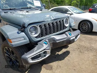 2024 Jeep Wrangler Sahara with VIN 1C4RJXP68RW270112, listed as a IAAI auction lot 42193921 with 23,792 mi miles and . Bid and sale history available at carsss.com. Image 6.