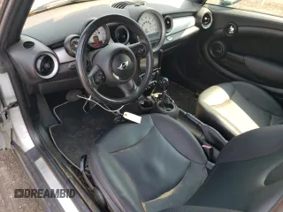 2014 MINI Convertible z VIN WMWZN3C55ET861050, wystawiony jako Copart lot #60014125 z przebiegiem 101 524 mil mil oraz Czysty tytuł • Clean title. Historia ofert i sprzedaży dostępna na DreamBid. Obrazek 8.