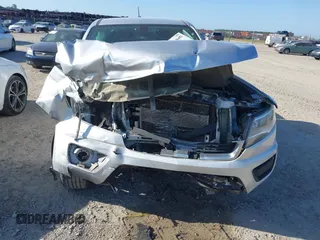 2019 Chevrolet Colorado 2WD LT z VIN 1GCGSCEN9K1283509, wystawiony jako IAAI lot #42146482 z przebiegiem Nie podano mil oraz . Historia ofert i sprzedaży dostępna na DreamBid. Obrazek 12.