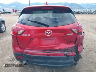 2014 Mazda CX-5 Touring with VIN JM3KE2CY3E0355296, listed as a IAAI auction lot 41688625 with 164,390 mi miles. Bid and sale history available at carsss.com. Image 16.
