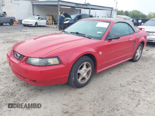 2004 Ford Mustang Deluxe with VIN 1FAFP44694F196850, listed as a IAAI auction lot 41917890 with 146,585 mi miles. Bid and sale history available at carsss.com. Image 2.