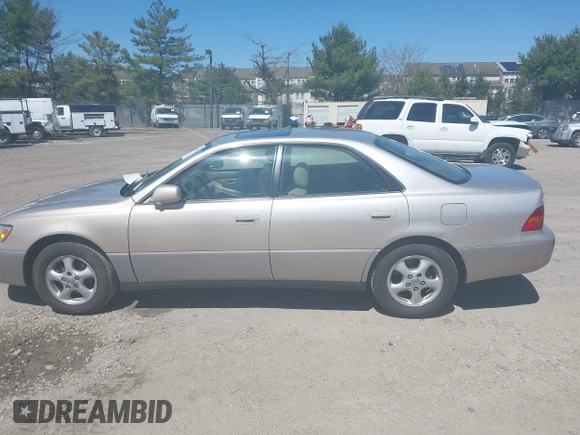 1998 Lexus ES 300 with VIN JT8BF28G6W5042042, listed as a IAAI auction lot 42000714 with 115,279 mi miles and . Bid and sale history available at DreamBid. Image 14.