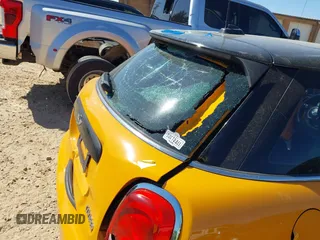 2016 MINI Hardtop 4 Door with VIN WMWXU1C58G2D08712, listed as a IAAI auction lot 42038278 with 96,874 mi miles and . Bid and sale history available at DreamBid. Image 6.