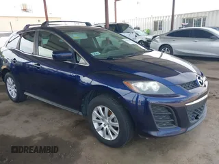 2010 Mazda CX-7 Sport with VIN JM3ER2WM1A0335634, listed as a IAAI auction lot 41846514 with 228,770 mi miles and . Bid and sale history available at DreamBid. Image 1.