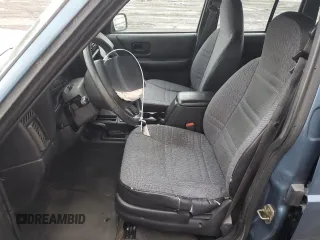 1999 Jeep Cherokee SE with VIN 1J4FF28S9XL576313, listed as a Copart auction lot 88470435 with Not provided miles and Salvage title. Bid and sale history available at DreamBid. Image 7.
