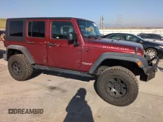 2010 Jeep Wrangler Unlimited Rubicon with VIN 1J4BA6H13AL140902, listed as a Copart auction lot 54335455 with 118,423 mi miles and Clean title. Bid and sale history available at DreamBid. Image 4.