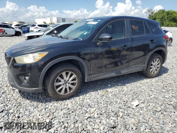 2014 Mazda CX-5 Touring z VIN JM3KE2CY8E0326988, wystawiony jako Copart lot #60473715 z przebiegiem 231 055 mil mil oraz Czysty tytuł • Clean title. Historia ofert i sprzedaży dostępna na DreamBid. Obrazek 1.