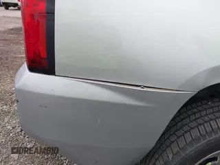 2019 Chevrolet Tahoe LT z VIN 1GNSCBKC1KR191789, wystawiony jako IAAI lot #42144961 z przebiegiem 94 178 mil mil oraz . Historia ofert i sprzedaży dostępna na DreamBid. Obrazek 6.