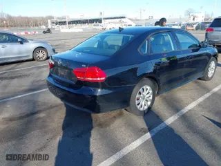 2015 Volkswagen Passat 1.8T Wolfsburg Ed with VIN 1VWAT7A34FC004649, listed as a IAAI auction lot 41728398 with 91,651 mi miles. Bid and sale history available at carsss.com. Image 4.