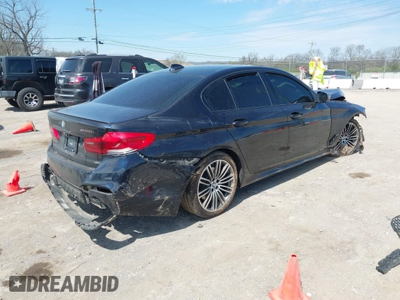 2019 BMW 5 Series M550i xDrive with VIN WBAJB9C51KB288853, listed as a IAAI auction lot 41905019 with Not provided miles and . Bid and sale history available at DreamBid. Image 4.