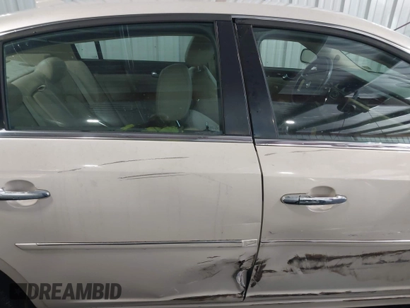 2011 Buick Lucerne CXL with VIN 1G4HC5EM4BU127554, listed as a IAAI auction lot 41879979 with 102,588 mi miles and . Bid and sale history available at DreamBid. Image 13.