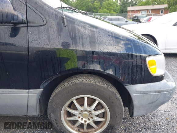 1998 Toyota Sienna LE with VIN 4T3ZF13C6WU016001, listed as a IAAI auction lot 42604162 with 214,491 mi miles and . Bid and sale history available at DreamBid. Image 14.