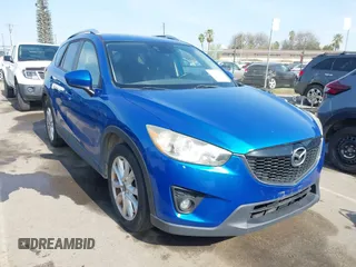 2014 Mazda CX-5 Grand Touring with VIN JM3KE4DY1E0327703, listed as a IAAI auction lot 41755735 with 206,845 mi miles. Bid and sale history available at carsss.com. Image 1.
