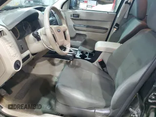 2011 Ford Escape XLS z VIN 1FMCU9C77BKC43662, wystawiony jako Copart lot #51779335 z przebiegiem 104 548 mil mil oraz Szkoda całkowita • Salvage title. Historia ofert i sprzedaży dostępna na DreamBid. Obrazek 7.