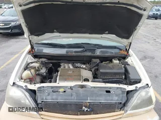 1999 Lexus RX 300 Luxury SUV with VIN JT6GF10U5X0038086, listed as a IAAI auction lot 41571366 with 214,094 mi miles. Bid and sale history available at carsss.com. Image 10.
