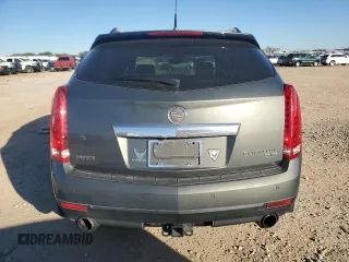 2013 Cadillac SRX Premium Collection z VIN 3GYFNEE35DS605779, wystawiony jako Copart lot #84451744 z przebiegiem 60 339 mil mil oraz Czysty tytuł • Clean title. Historia ofert i sprzedaży dostępna na DreamBid. Obrazek 6.
