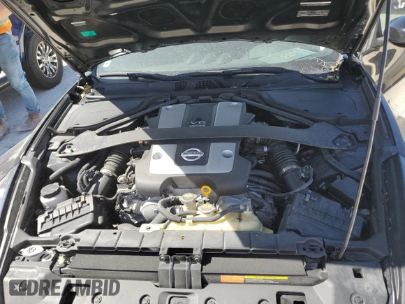 2020 Nissan 370Z Sport с VIN JN1AZ4EHXLM822854, выставлен на аукционе Copart как лот 77241774 с пробегом Не указан миль и На запчасти • Non repairable. История ставок и продаж доступна на DreamBid. Изображение 11.
