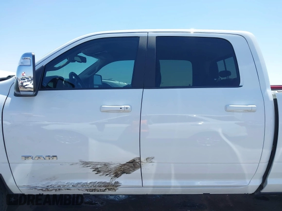 2023 Ram 2500 Laramie with VIN 3C6UR5FL2PG559276, listed as a IAAI auction lot 42281324 with 23,526 mi miles and . Bid and sale history available at DreamBid. Image 14.