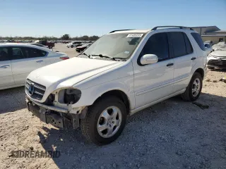 2004 Mercedes-Benz M-Class 3.5L with VIN 4JGAB57E04A507389, listed as a Copart auction lot 41489205 with 215,044 mi miles and Salvage Title. Bid and sale history available at carsss.com. Image 1.