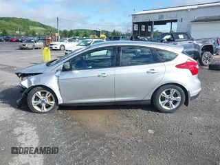2012 Ford Focus SE z VIN 1FAHP3K27CL241013, wystawiony jako IAAI lot #42198812 z przebiegiem 121 888 mil mil oraz . Historia ofert i sprzedaży dostępna na DreamBid. Obrazek 15.