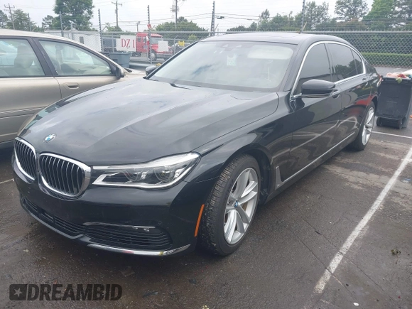 2018 BMW 7 Series 750i z VIN WBA7F0C59JGM23945, wystawiony jako IAAI lot #42236737 z przebiegiem 65 576 mil mil oraz . Historia ofert i sprzedaży dostępna na DreamBid. Obrazek 17.