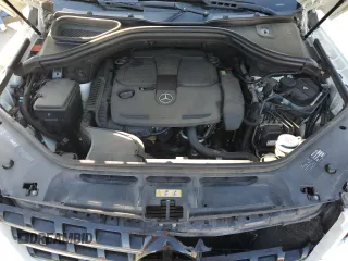 2012 Mercedes-Benz M 350 z VIN 4JGDA5HBXCA036533, wystawiony jako Copart lot #46351995 z przebiegiem 158 298 mil mil oraz Szkoda całkowita • Salvage title. Historia ofert i sprzedaży dostępna na DreamBid. Obrazek 14.
