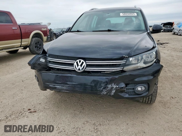 2012 Volkswagen Tiguan SE z VIN WVGAV7AX2CW575871, wystawiony jako Copart lot #58050865 z przebiegiem 96 569 mil mil oraz Szkody całkowita. Historia ofert i sprzedaży dostępna na DreamBid. Obrazek 5.