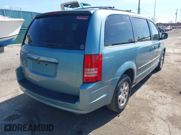 2008 Chrysler Town & Country Touring with VIN 2A8HR54P68R115192, listed as a IAAI auction lot 42141588 with 239,819 mi miles. Bid and sale history available at carsss.com. Image 4.